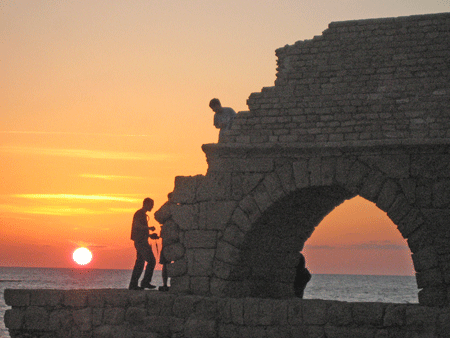 Caesarea's ancient aqueduct at sunset