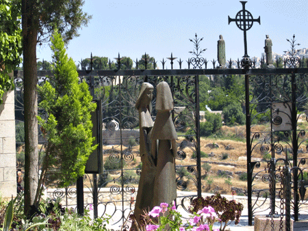 Mary meeting Elizabeth at the entrance to the Visitation Church in Ein Karem