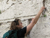 Putting a prayer request in the Western Wall