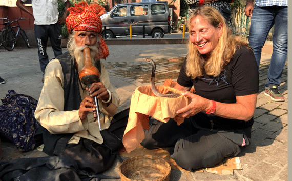 Gila holding a cobra in Delhi India