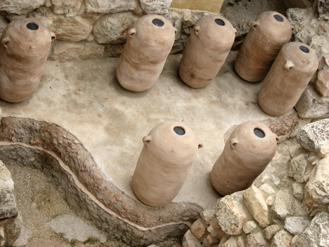 Models of the 12 cylindrical-shaped clay storage jars