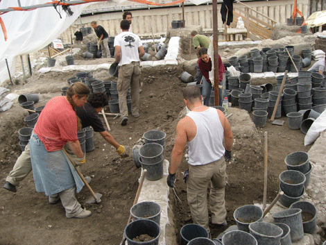 Volunteer excavators digging below the Dung Gate